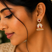 Pearl and Ruby Jhumka Earrings.