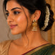 Gold Plated Traditional Peacock Jhumka Pattern Earrings