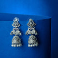 Rhodium Plated Floral Motifs & Intricate Traditional Stone Work Pearl Drops Jhumka Earrings
