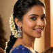 Rhodium Plated Floral Motifs & Intricate Traditional Stone Work Pearl Drops Jhumka Earrings