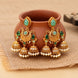 Mehendi Plated Traditional Jhumka Earrings with Floral Filigree, Circular Medallion, Teardrop and Lattice Pattern