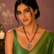 Ethnic Gemstone Mehendi Plated Locket Set with Sparkling Floral Pendant