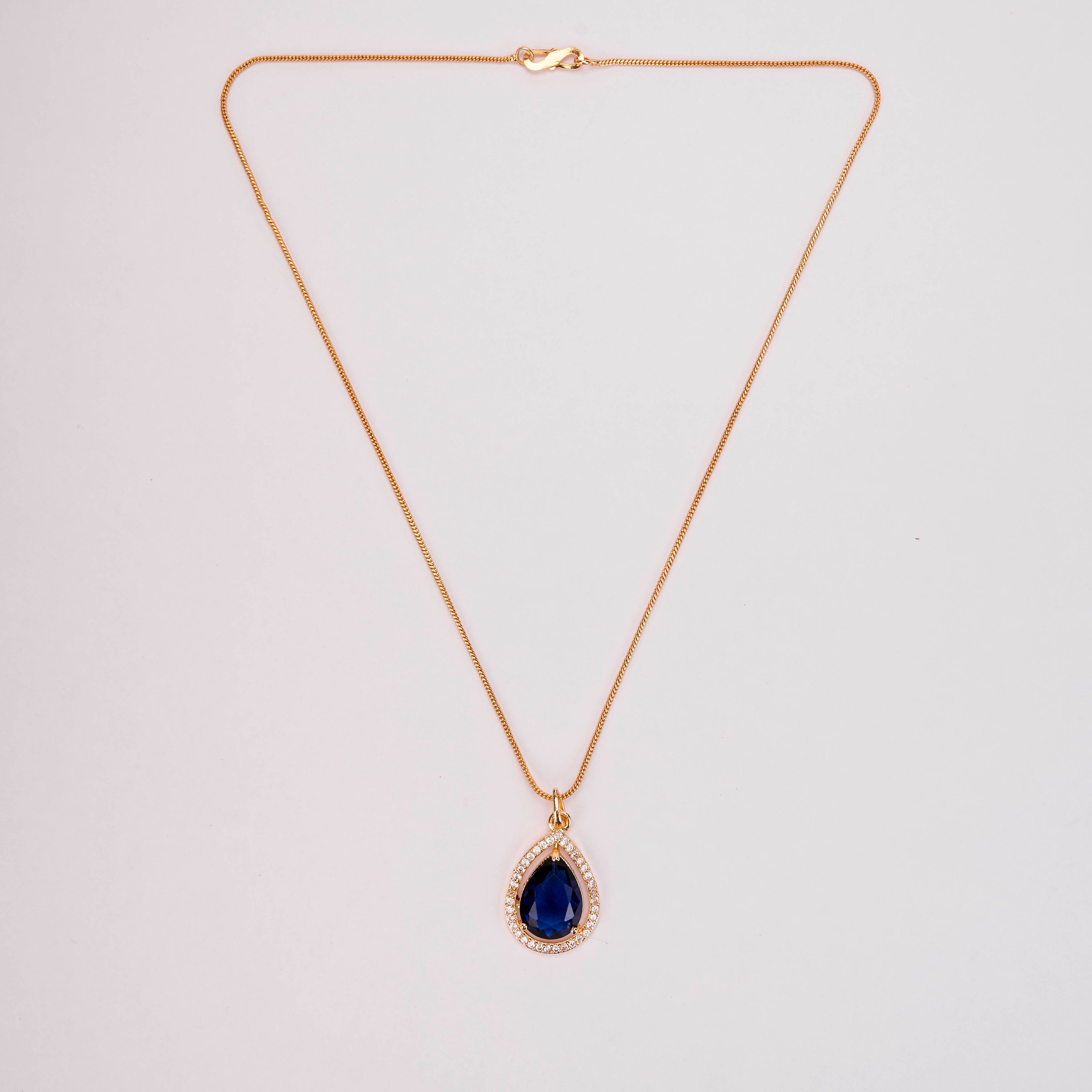 Oval Shape Gold Plated Pendant with chain-Crystal Blue