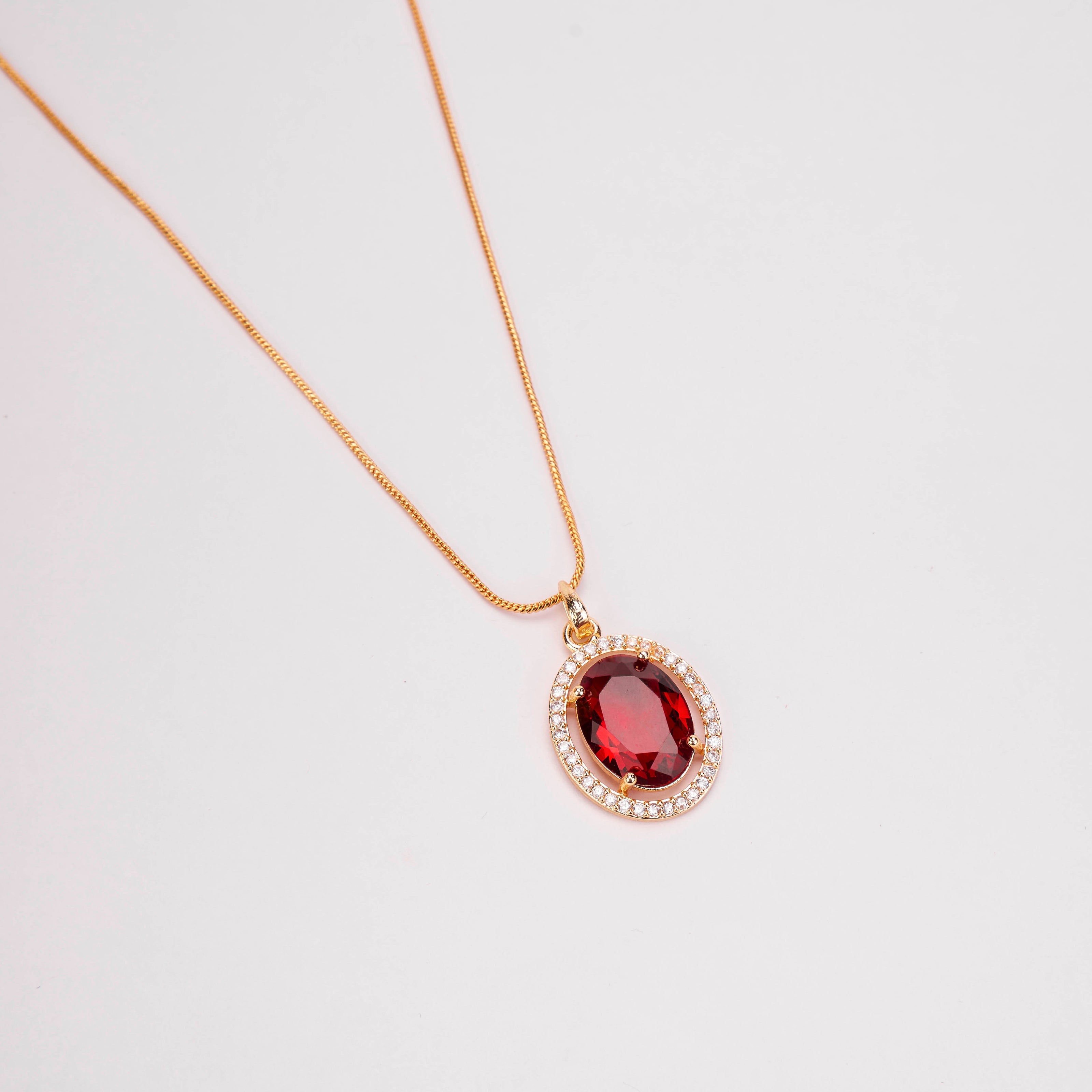 Oval Halo Design Gold Plated Pendant with chain-Crystal Red