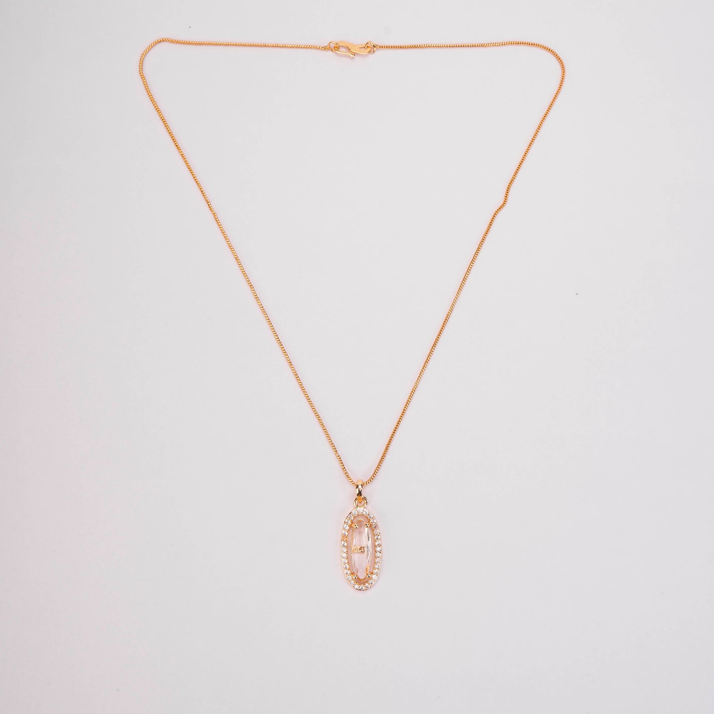Elongated Oval Halo Design Gold Plated Pendant with chain