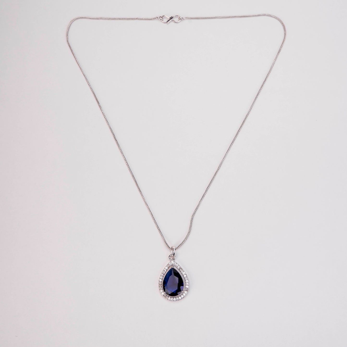 Oval Shape Rhodium Plated Pendant with chain-Crystal Blue