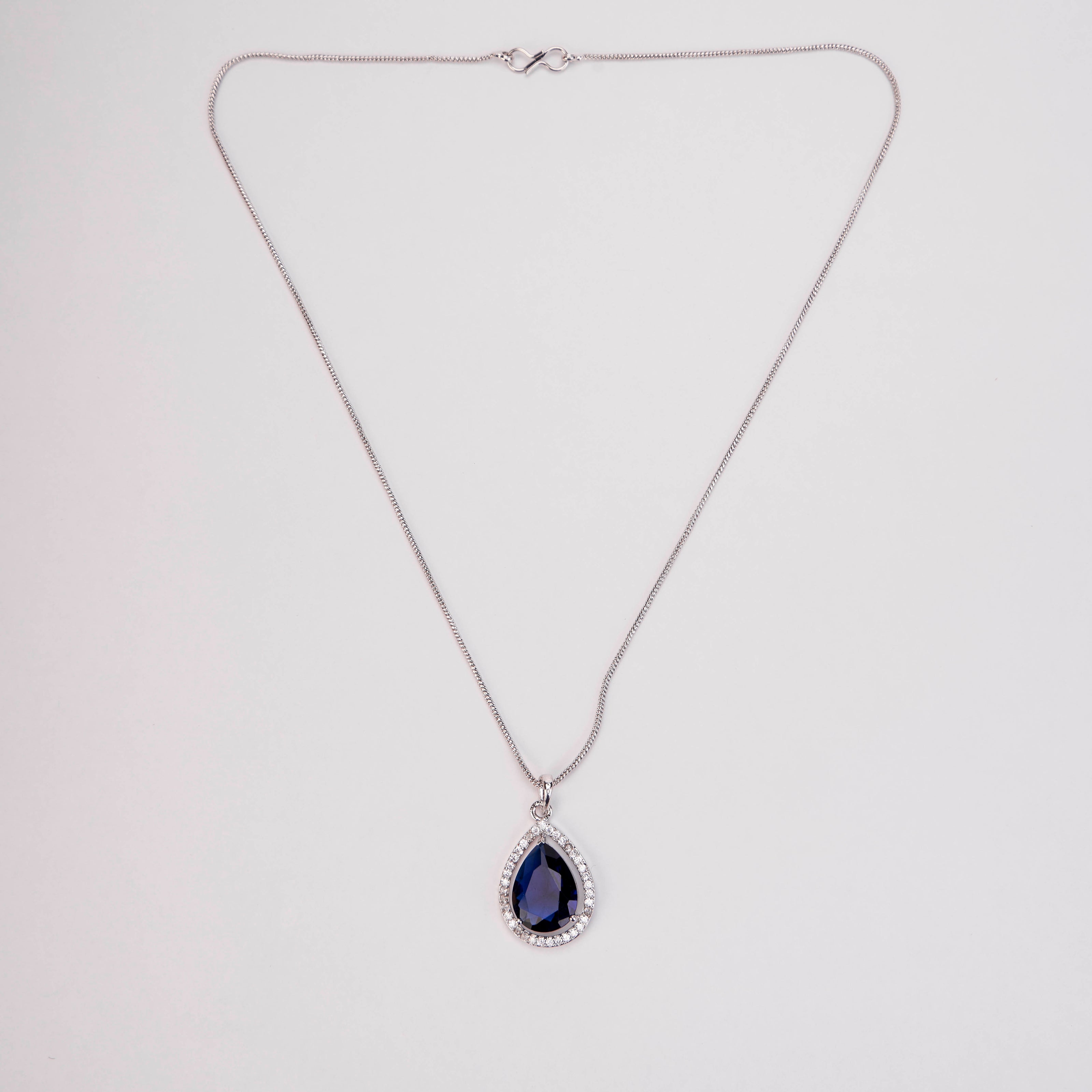 Oval Shape Rhodium Plated Pendant with chain-Crystal Blue