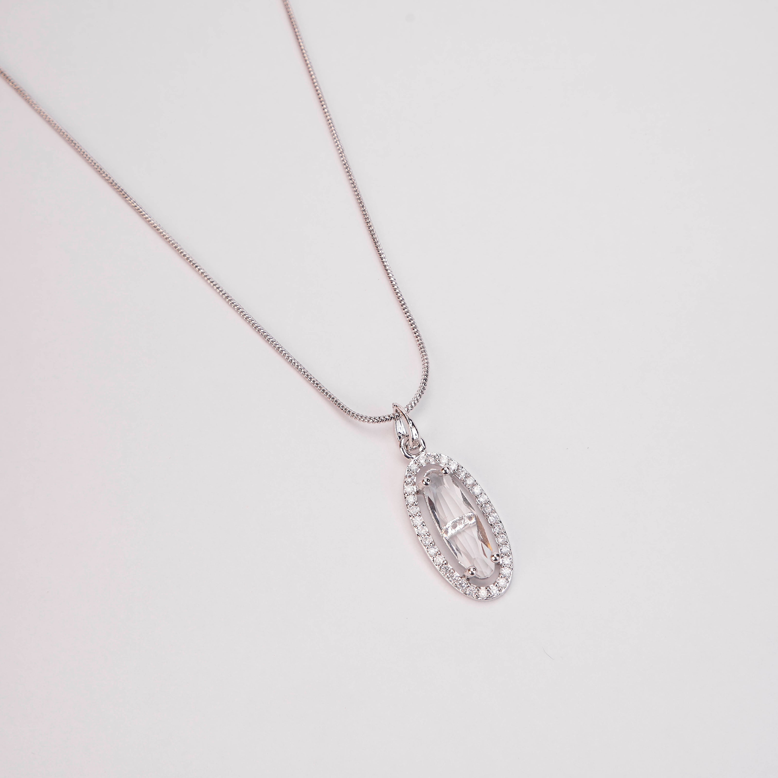 Elongated Oval Halo Design Rhodium Plated Pendant with chain