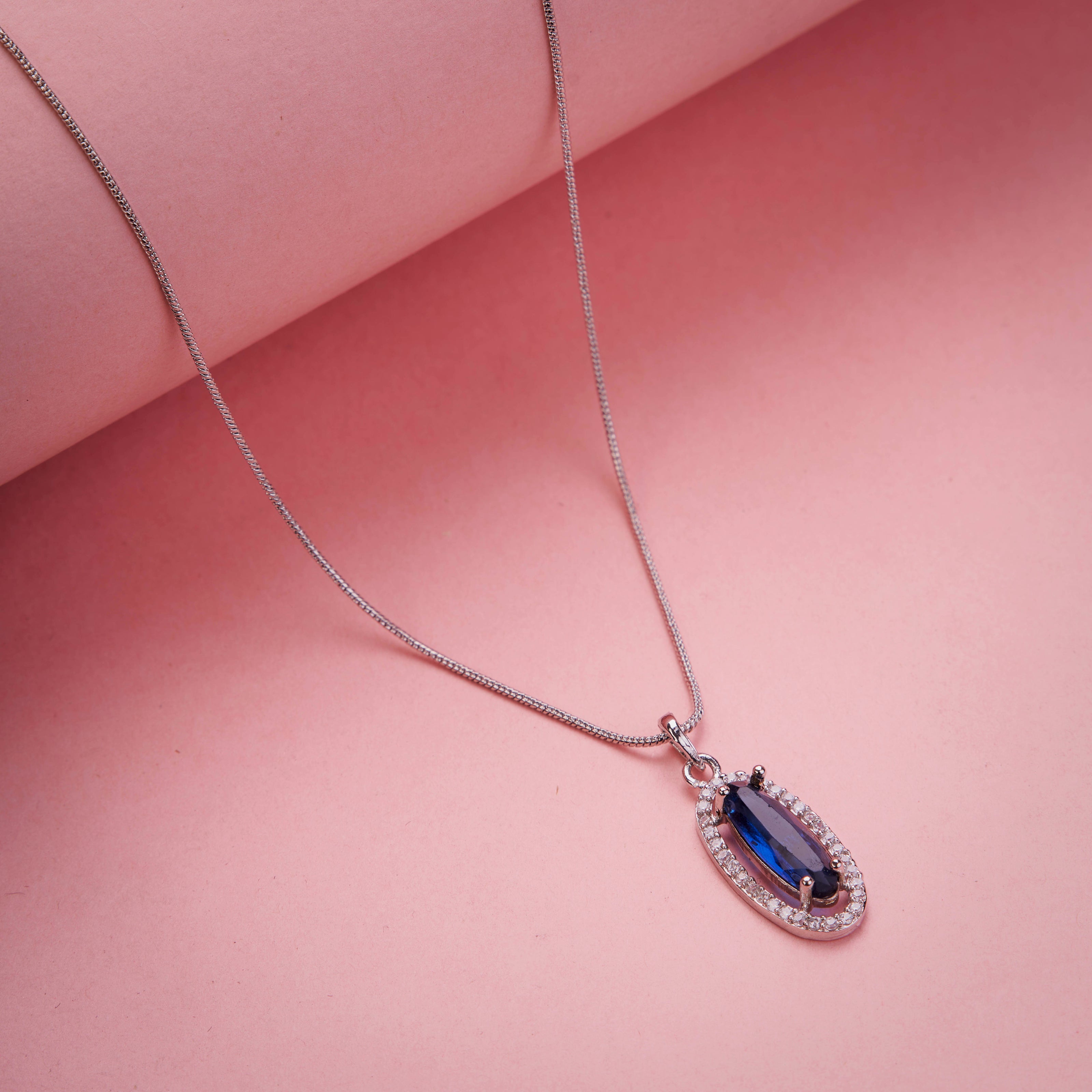 Elongated Oval Halo Design Rhodium Plated Pendant with chain-Crystal Blue