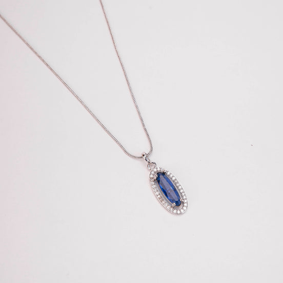Elongated Oval Halo Design Rhodium Plated Pendant with chain-Crystal Blue