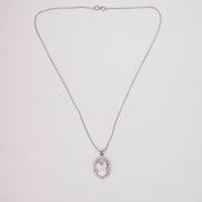 Rhodium Plated Round Pendant Necklace with Faceted Statement Stone