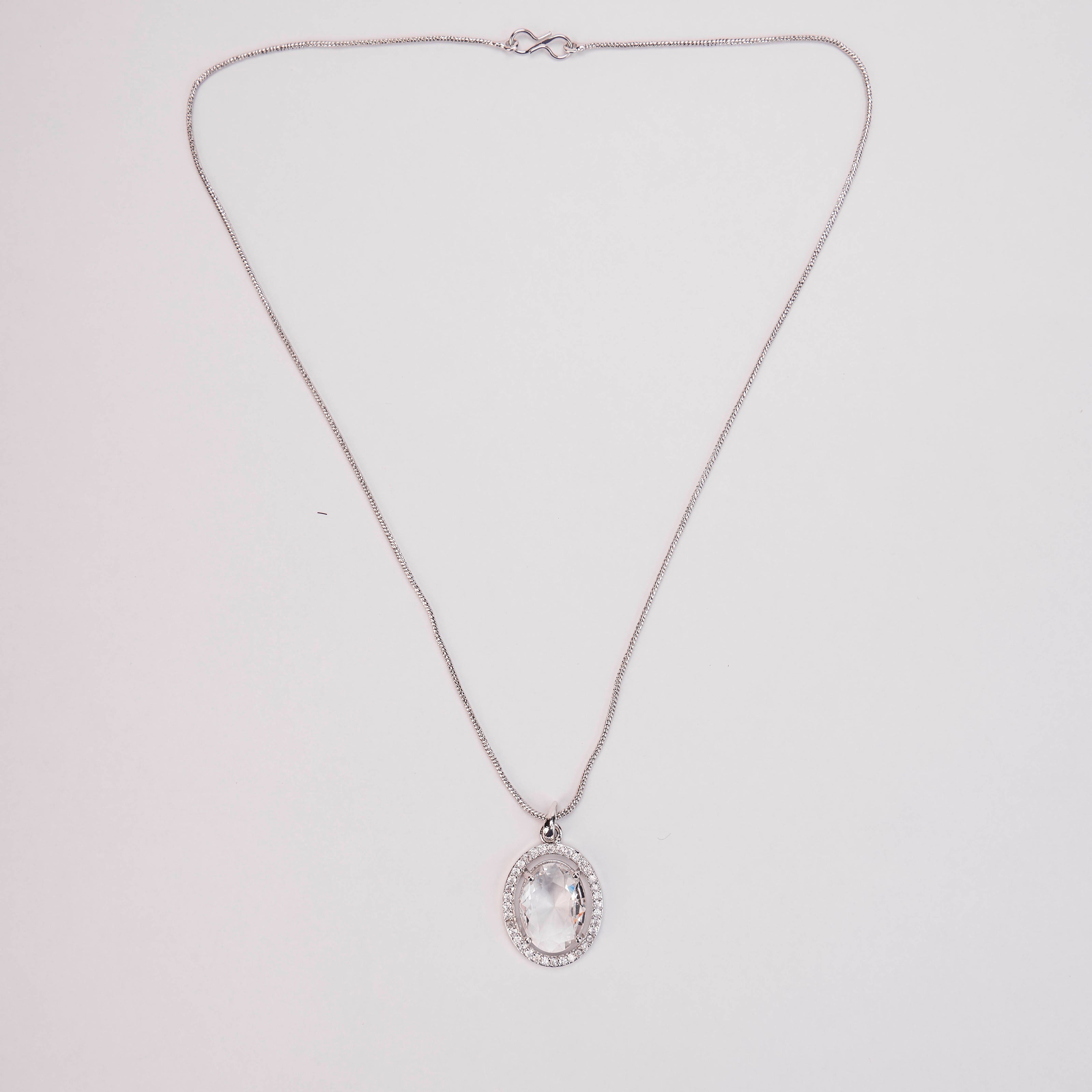Rhodium Plated Round Pendant Necklace with Faceted Statement Stone