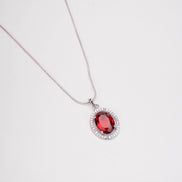 Rhodium Plated Round Pendant Necklace with Faceted Statement Stone