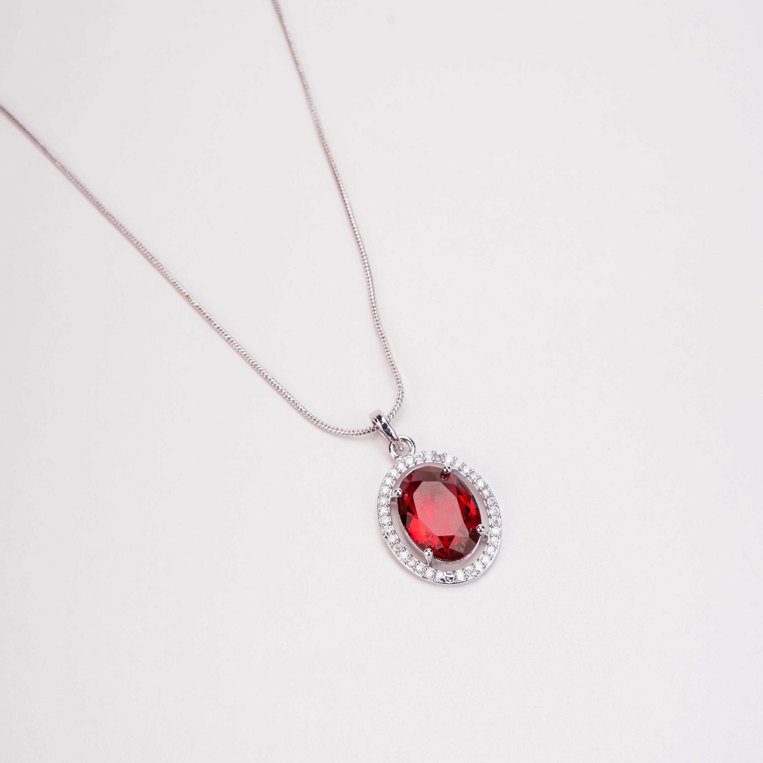 Rhodium Plated Round Pendant Necklace with Faceted Statement Stone