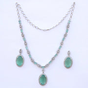 Rhodium Plated AD Necklace Set with Oval Halo Pendant and Matching Earrings