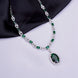 Rhodium Plated AD Necklace Set with Oval Halo Pendant and Matching Earrings