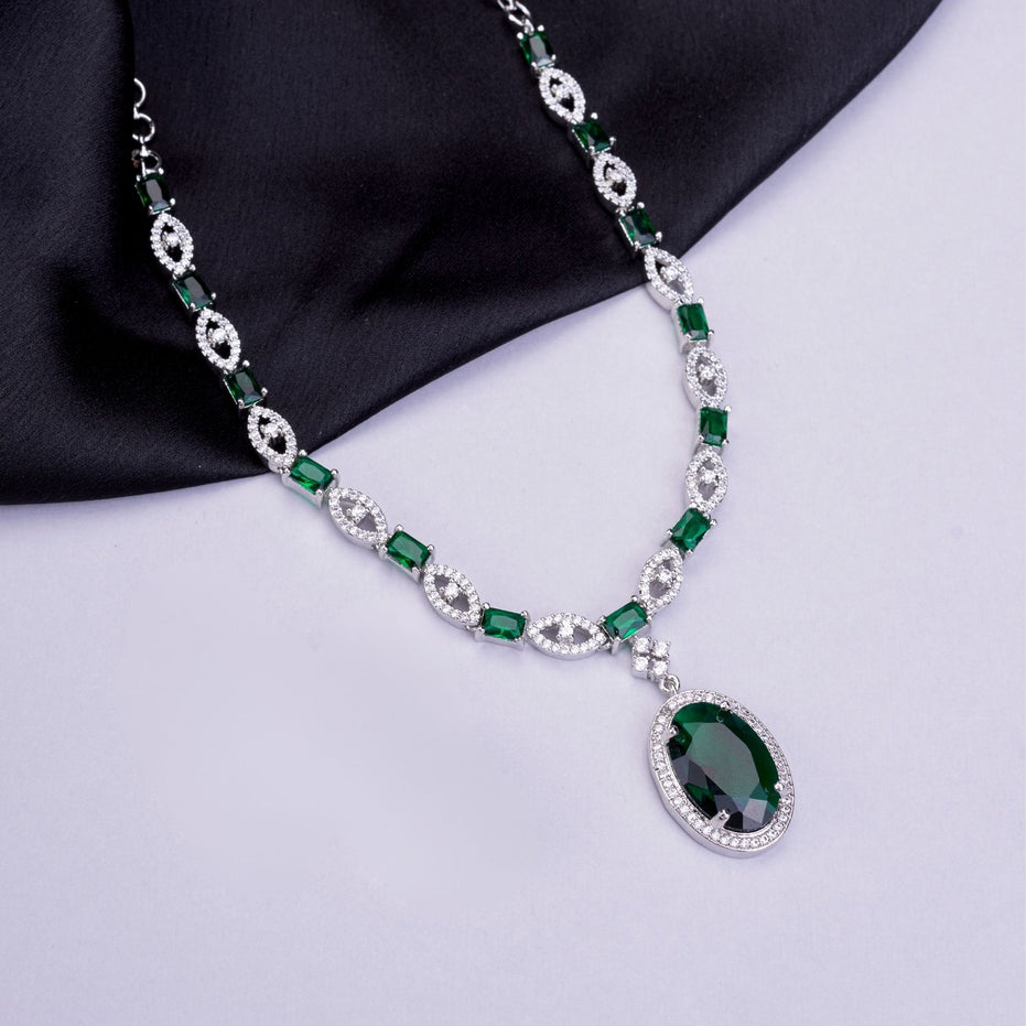 Rhodium Plated AD Necklace Set with Oval Halo Pendant and Matching Earrings