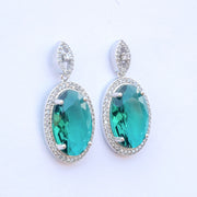 Rhodium Plated AD Necklace Set with Oval Halo Pendant and Matching Earrings