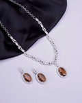 Rhodium Plated AD Necklace Set with Oval Halo Pendant and Matching Earrings
