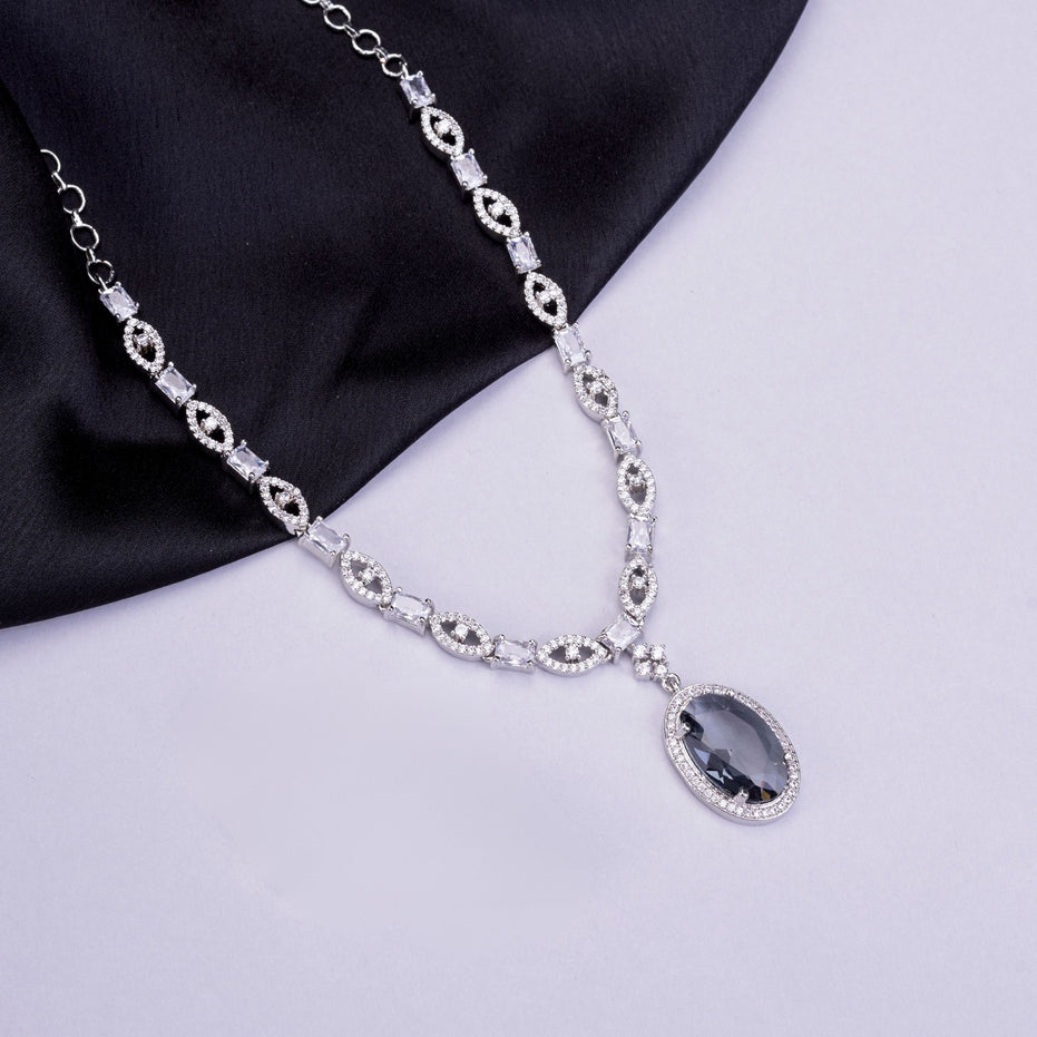 Rhodium Plated AD Necklace Set with Oval Halo Pendant and Matching Earrings