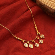 Gold Plated American Diamond Heart Charm Necklace with Stone Studded Dangle Charms