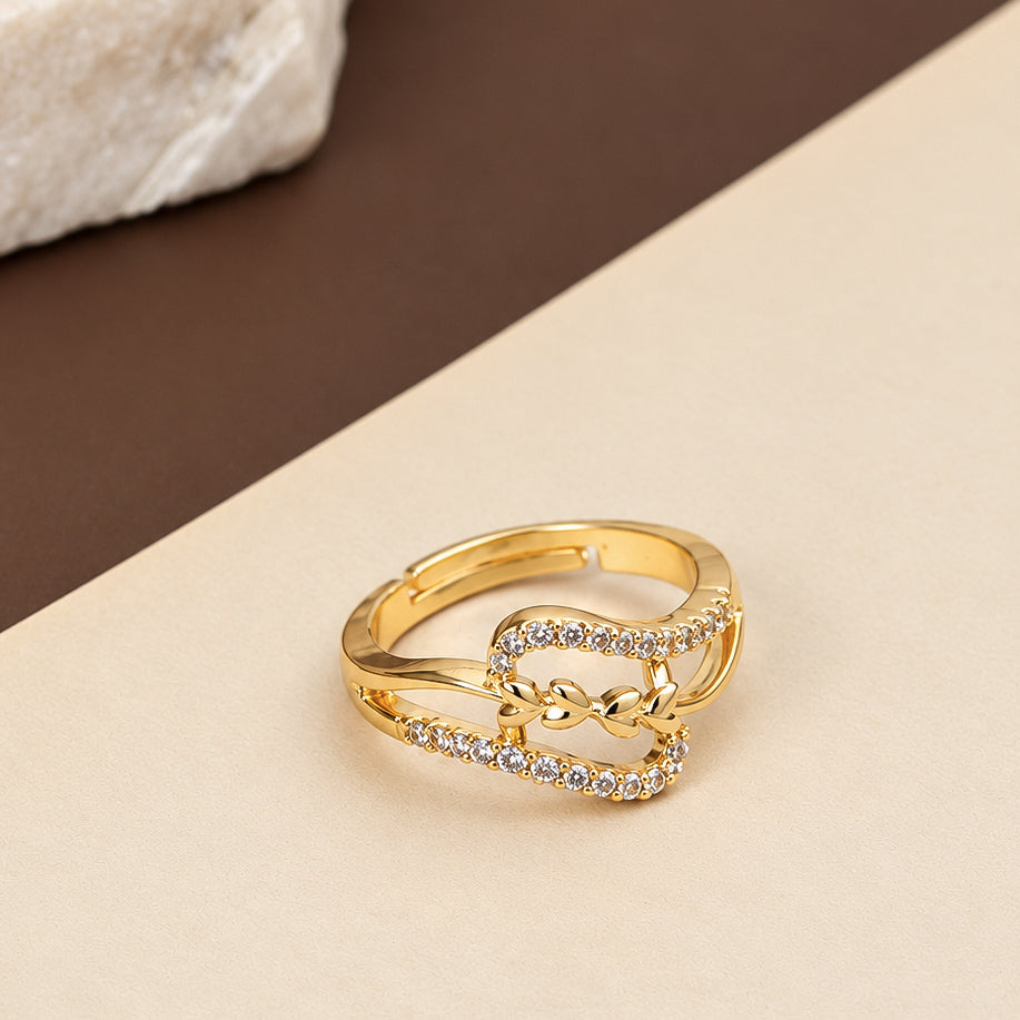 Gold Plated CZ Bow Pattern Ring with Intricate Crystal Detailing