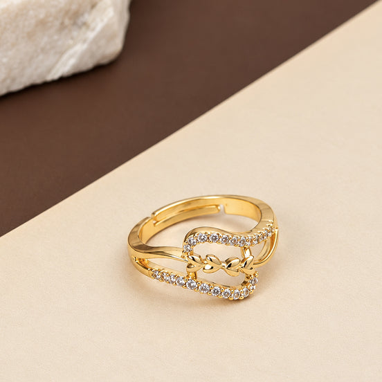 Gold Plated CZ Bow Pattern Ring with Intricate Crystal Detailing