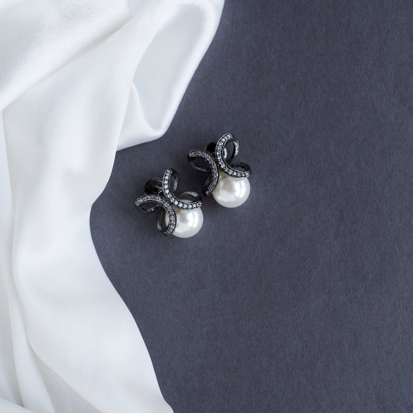 Black Plated Infinity Pearl Studs - Opal Touch