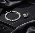 Round-Cut Diamond Tennis Bracelet & Cluster Ring