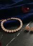 Tennis Bracelet with Round Stones & Heart Stud Earrings