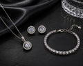 Rhodium Cubic Zirconia Pendant Necklace, Bracelet & Earrings Jewelry Set