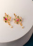 Elegant AD CZ Gold Plated Stud Earrings - Opal Touch