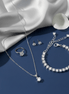 Elegant Rhodium AD Jewelry Set - Pendant, Studs, Ring & Bracelet - Opal Touch