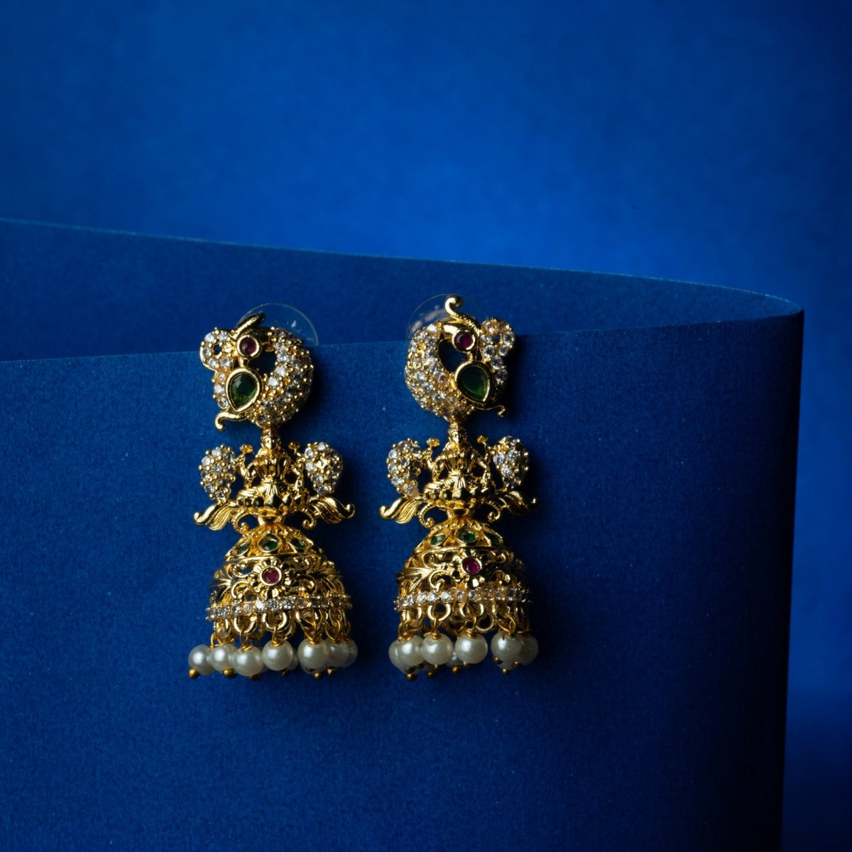 Gold Plated Temple Peacock Jhumka Earrings with Pearls - Opal Touch
